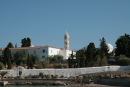 Spetses’ vartegn, klokketårnet på klosteret, der ligger langs havnefronten.