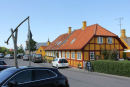 Den gamle brønd og kirken i Gudhjem.