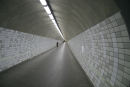 I Rendsburg er der en tunnel uder Kielerkanalen; den er 130 m lang og man kommer ned/op ved hjælp af en elevator eller en rullende trappe, som skulle være en af de længste i Europa. 