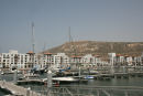 Marinaen i Agadir. Oppe på toppen af bjerget (236 m) ligger Kasbah’en, som et vartegn for byen. På bjergsiden står der skrevet i hvide sten: ”Gud, Fædrelandet og Kongen”.